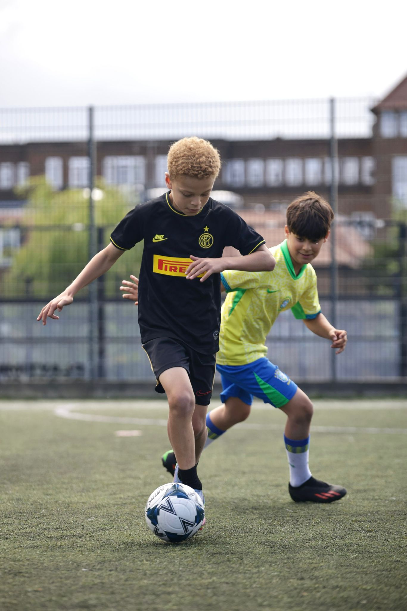 Young players practicing ball control drills