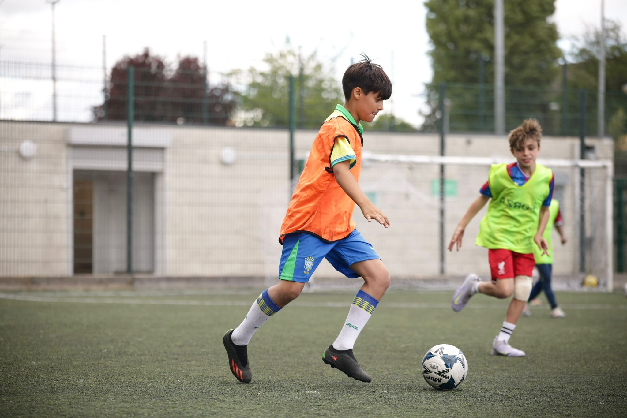 Coach demonstrating shooting technique
